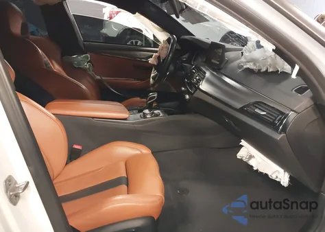 2018 BMW M5 z USA, uszkodzony, nr VIN WBSJF0C5XJB283452